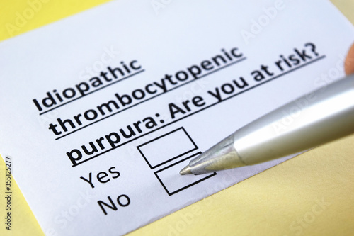 One person is answering question about idiopathic thrombocytopenic purpura. photo