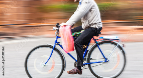 Abstract blurred image of cyclist