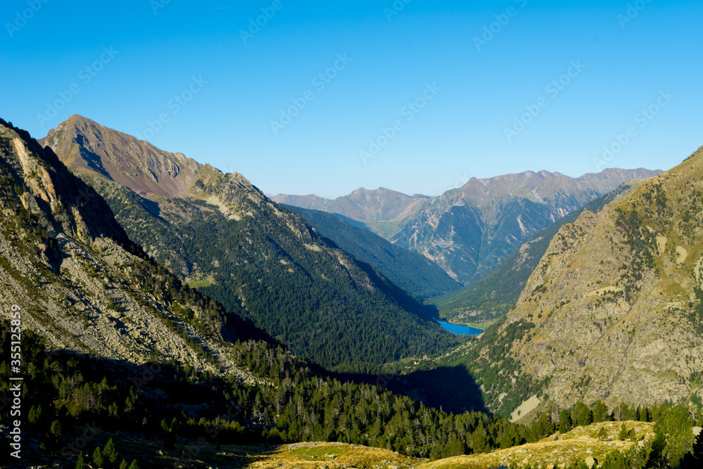 Nature and landscape of the Spanish Pyrenees, Aiguestortes i Estany de Sant Maurici, Carros de Foc hiking trail, with lake in background