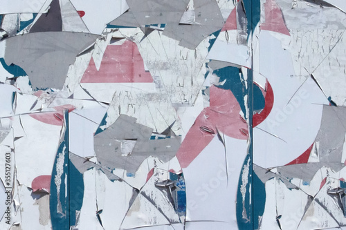 Background of old color posters, abstraction and texture.