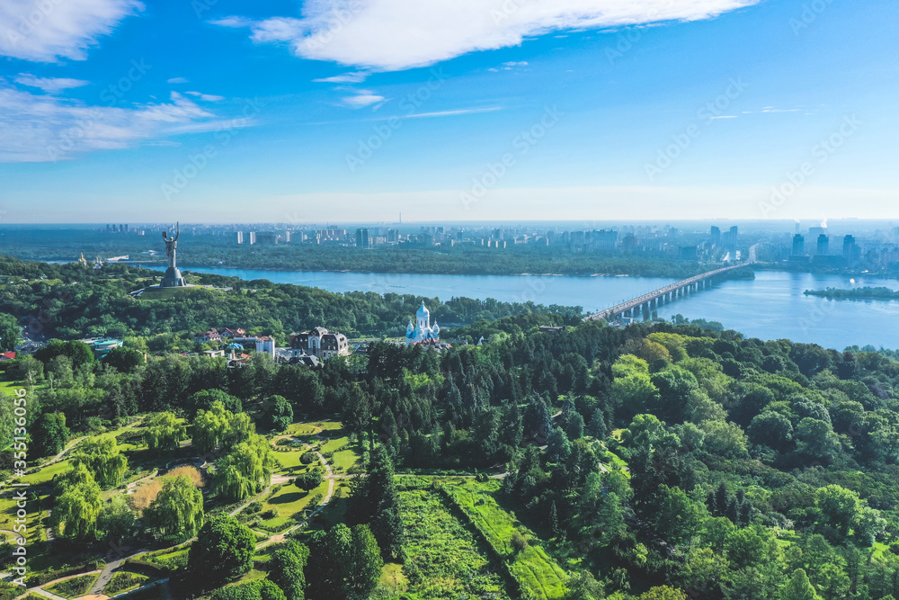 Panoramic view of the Left Bank of Kiev from the Botanical Garden. Aerial shot in the summer afternoon over Kiev. High quality photo