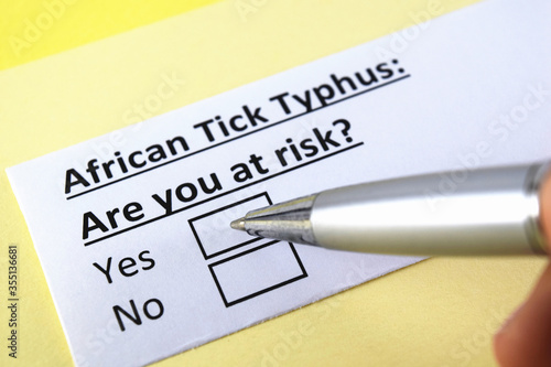 One person is answering question about african tick typhus.