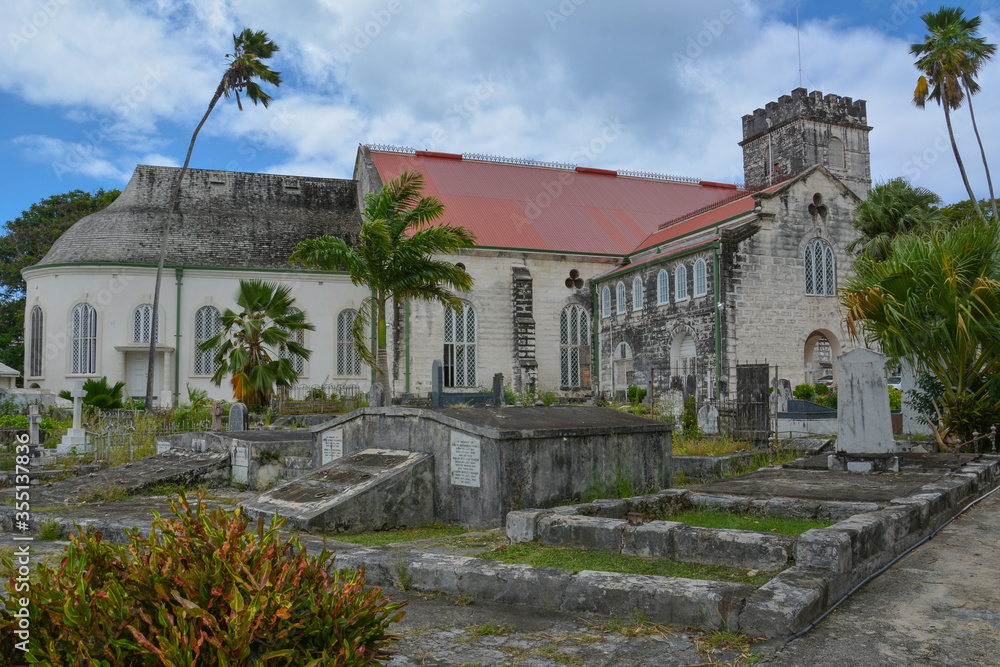 Bridgetown, Barbados, Caribbean - 22 Sept 2018: Tombstones and graves in the cemetery in front of the old Christian Anglican church. Copy space