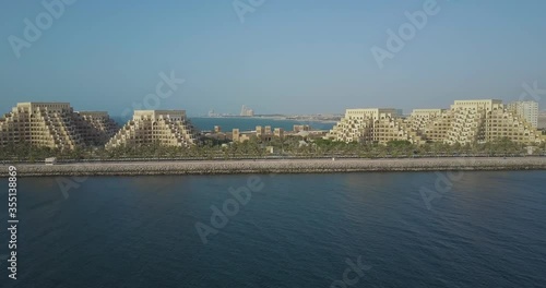 Luxury Hotel By The Sea And Desert In UAE - aerial shot photo