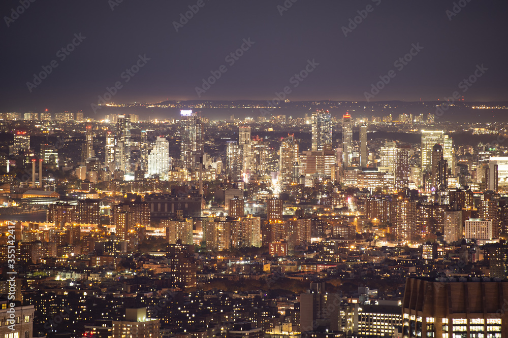 Stunning view of the New York City skyline illuminated at night. New York City (NYC), often called The City or simply New York (NY), is the most populous city in the United States.