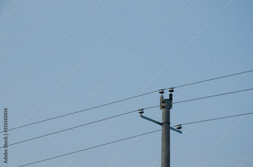 Electric pole and power line with blue sky. Electric pole and power line with blue sky.