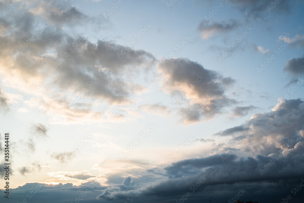 Fototapeta premium Colored sunset with clouds after a thunderstorm