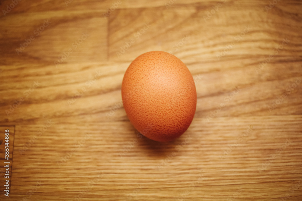 Egg on wooden table. Egg on wooden table.