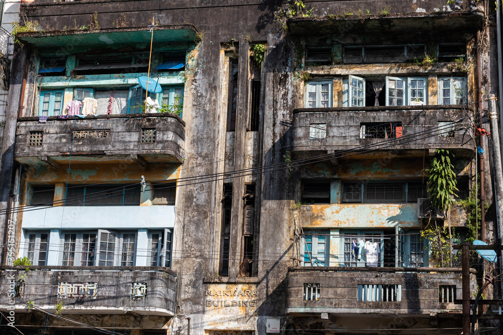 Apartments building with balconies. Facade in need of renovation. Yangon - Rangoon, Myanmar - Burma, Southeast Asia