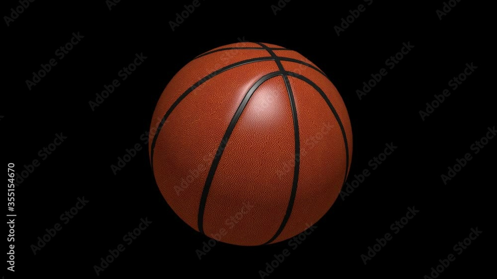Rotating basketball on a black background Rotating basketball on a black background