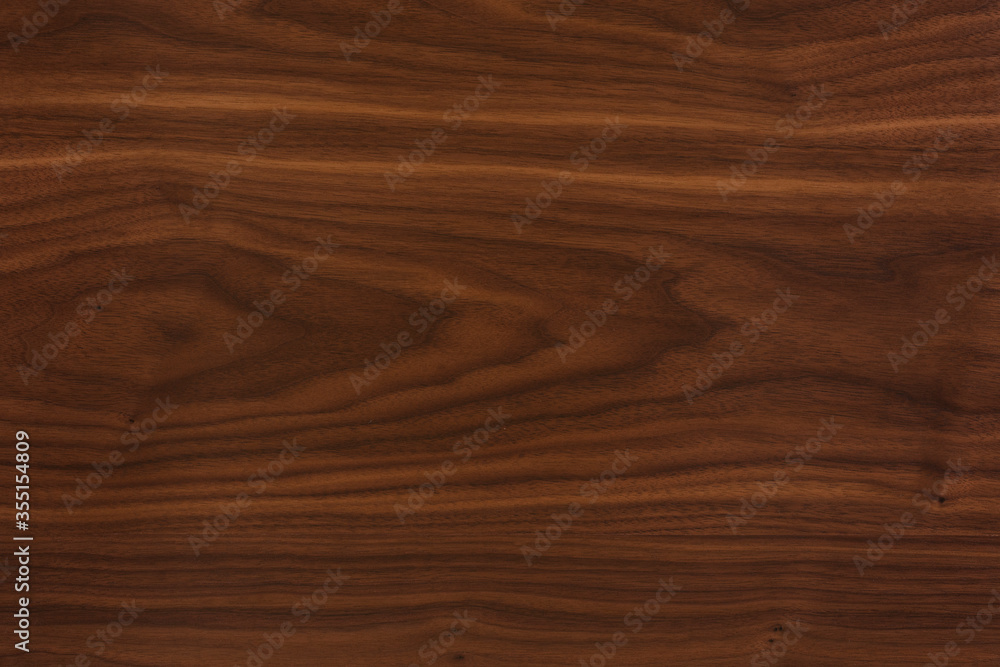 Naklejka premium Fornir orzechowy, naturalny wzór drewna do produkcji mebli, parkietu, drzwi.