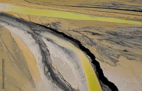 removed sediment (lime, clay, sludge) in a limestone quarry - abgetragener Bodensatz (Kalk, Lehm, Schlamm) in einem Kalksteinbruch photo