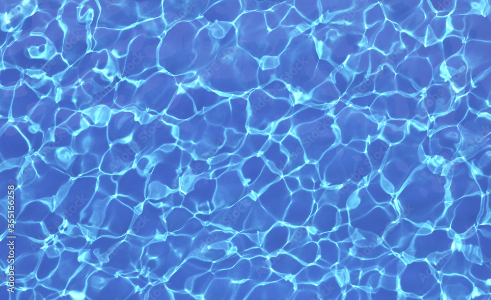 Blue water in swimming pool with sun reflections. Top view Blue water in swimming pool with sun reflections. Top view