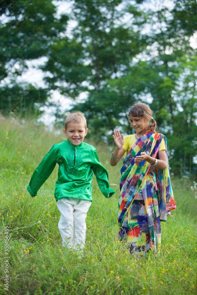 A lot of small children, boys and girls, dressed in the clothing culture of India. A lot of small children, boys and girls, dressed in the clothing culture of India.