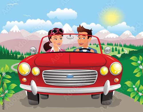 Couple driving along mountain road