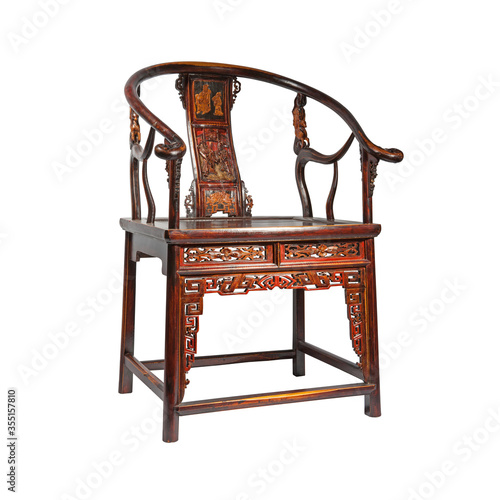 Antique wooden chinese chair isolated on white photo