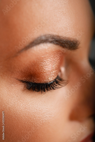 Attractive brunette with gentle daytime makeup