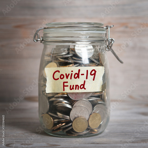 money jar with covid19 fund
