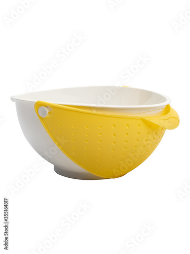 white and yellow colander for kitchen