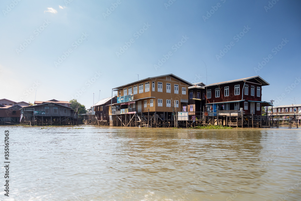 Floating village houses along Inle Lake in Burma Floating village houses along Inle Lake in Burma