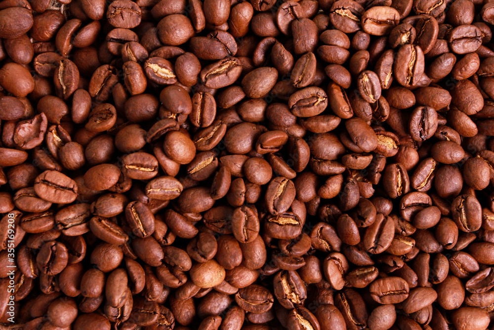 Coffee bean texture background. Top view. Espresso, traditional roast, coffee shop concept Coffee bean texture background. Top view. Espresso, traditional roast, coffee shop concept