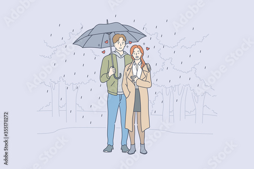 Love, relationship, romance concept. Young loving couple boyfriend and girfriend man and woman cartoon characters standing embraced with umbrella in rain vector. Romantic date in park illustration. photo