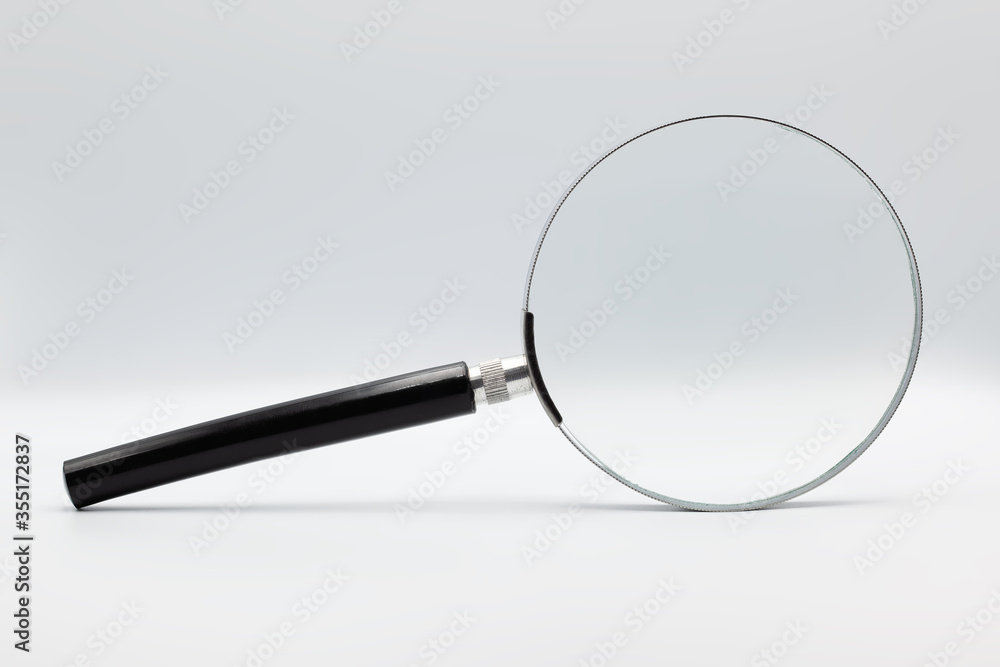 Magnifying glass in studio enviroment Magnifying glass in studio enviroment