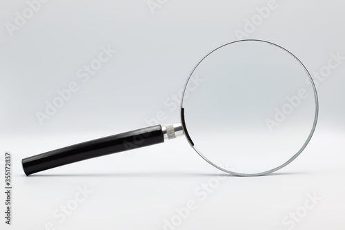 Magnifying glass in studio enviroment