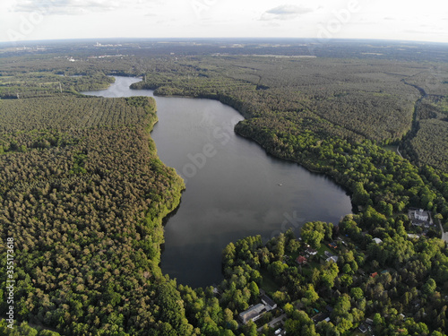Aerial view of lake Bötzsee which is about four km long and 400 m wide and stretches between the towns of Altlandsberg and Strausberg in the district of Märkisch-Oderland, in the state of Brandenburg.