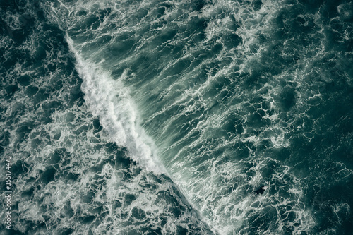 wave breaking over reef from above
