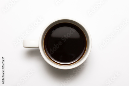 top view a cup of espresso black coffee isolated on white background