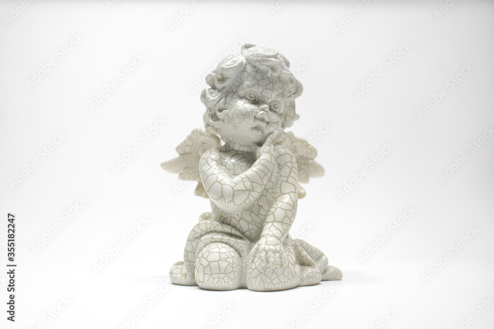 statue of a angel on a white background
