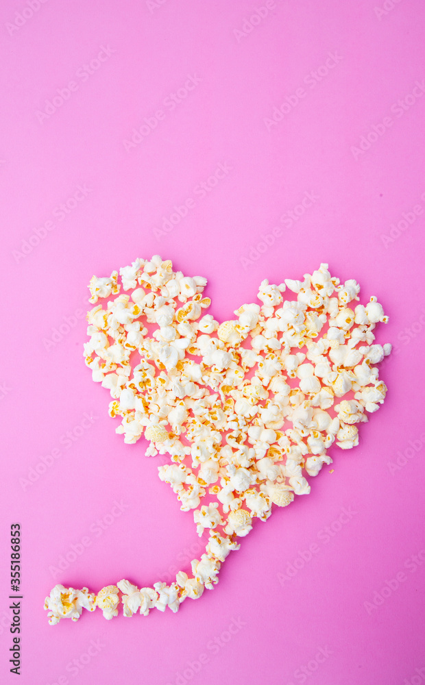 popcorn on pink color background
