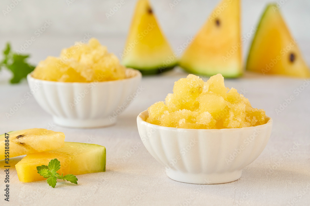 Yellow watermelon granita or sorbet with mint leaves