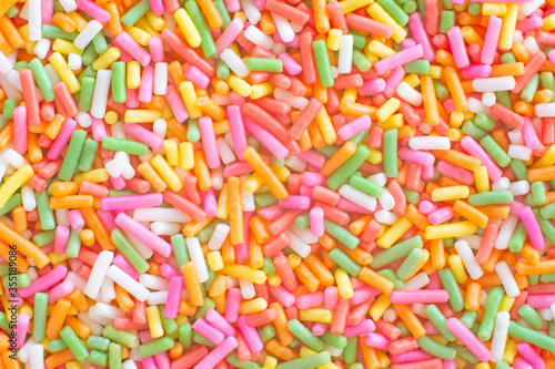 Colorful rainbow sprinkles sugar texture pattern background. for cake , bakery and ice-cream or other