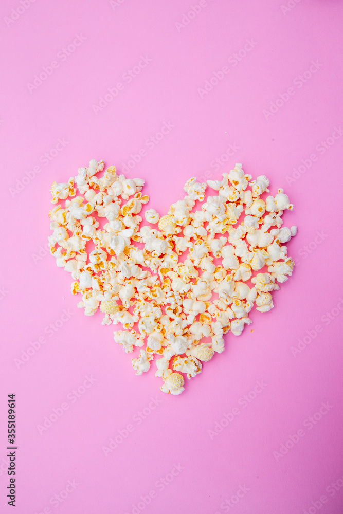 popcorn on pink color background