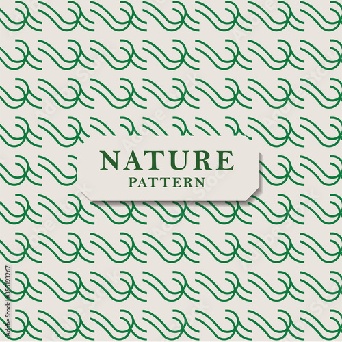 Seamless nature pattern with green leaves. Seamless vector texture. Leaves pattern perfect for wrapping paper and packaging design.
