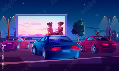 Outdoor cinema, drive-in movie theater with cars on open air parking. Vector cartoon illustration of summer night city with girls sitting on automobile roof and watching film on big screen