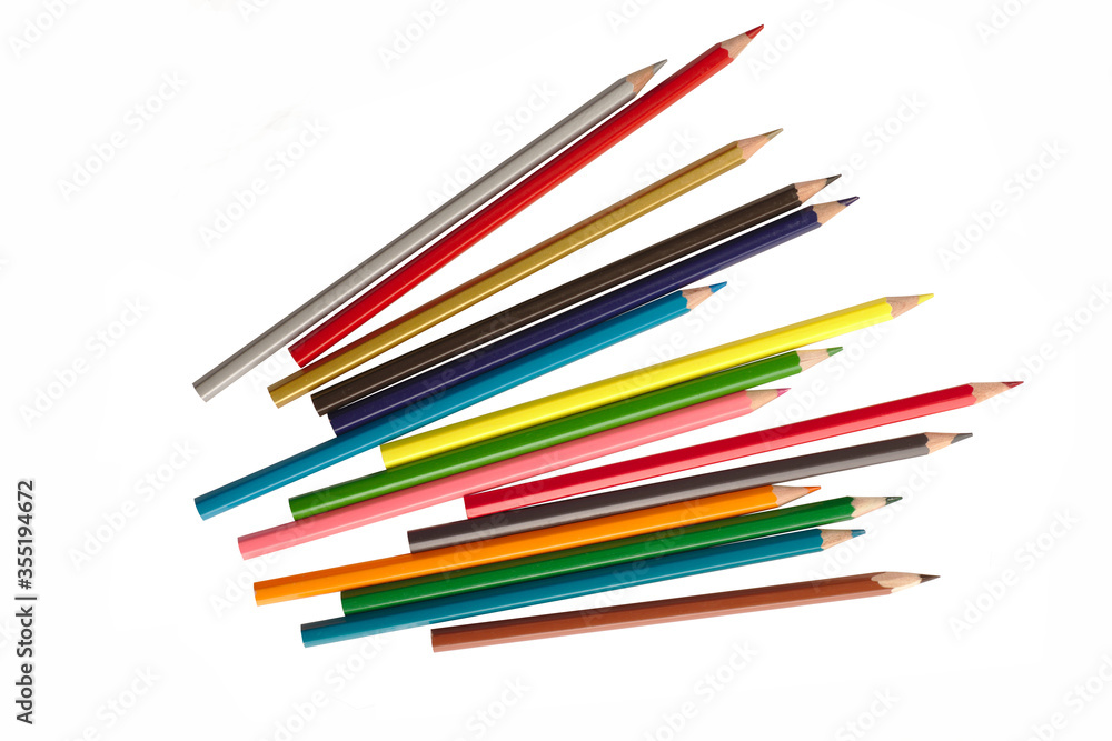 wooden color pencils arranged in bulk on a white isolated background wooden color pencils arranged in bulk on a white isolated background