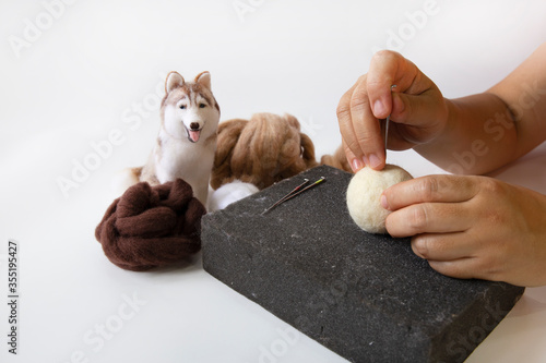 A kind of modern hobby, felt. A mini Siberian doll  is made.
Accessories for needle felt, wool weaving handmade craft by sheep hair. Doll was made by sheep hair wool
