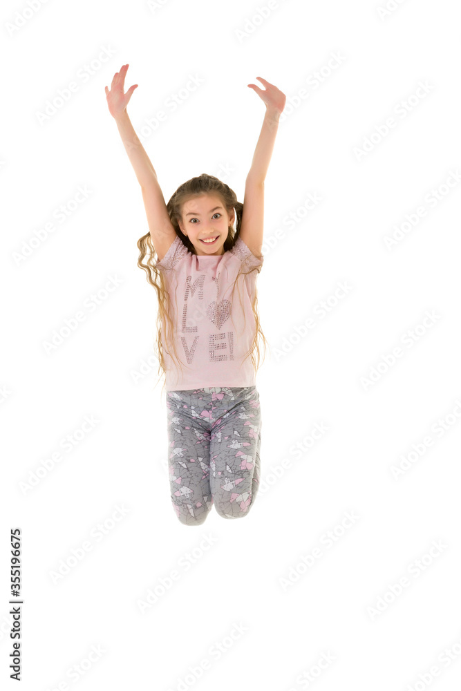 The little girl is jumping fun.The concept of a good mood, summer vacation. The little girl is jumping fun.The concept of a good mood, summer vacation.