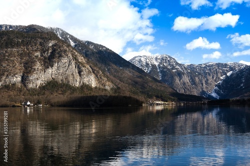 View idyllic Alpine mountains and lake. Sunny winter morning in Hallstatt, Austria, Europe