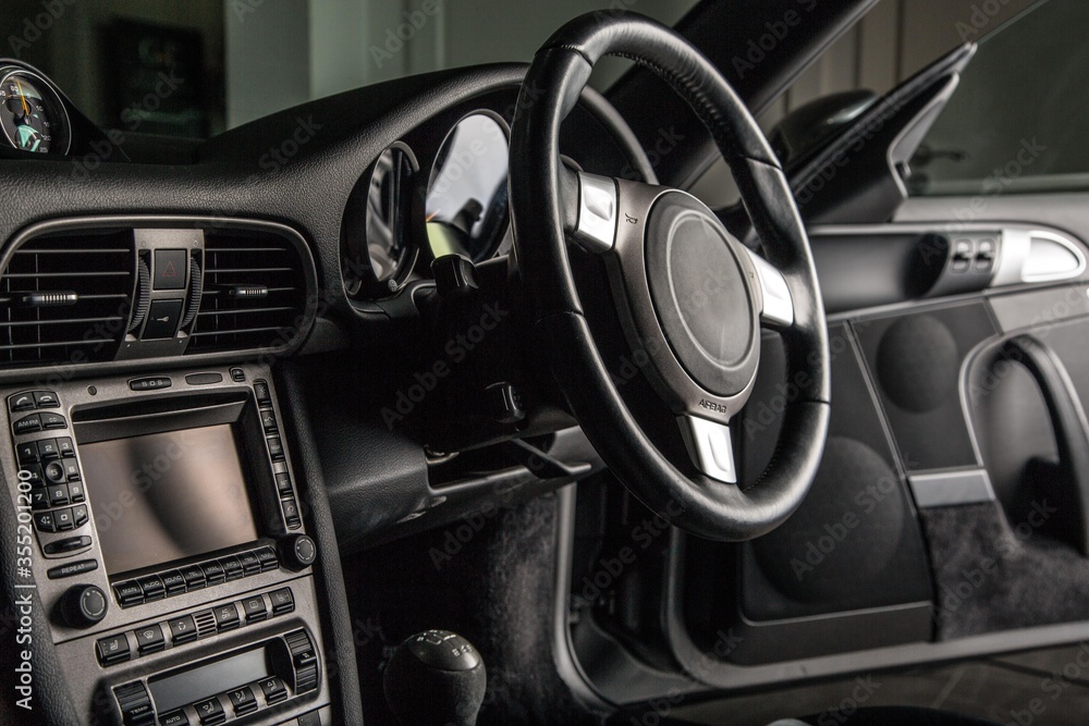 Steering wheel close up in car interior