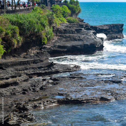 Evening in Tanha Lot, Bali Indonesia, Beautiful Tanha lot beach view in the evening at Bali photo