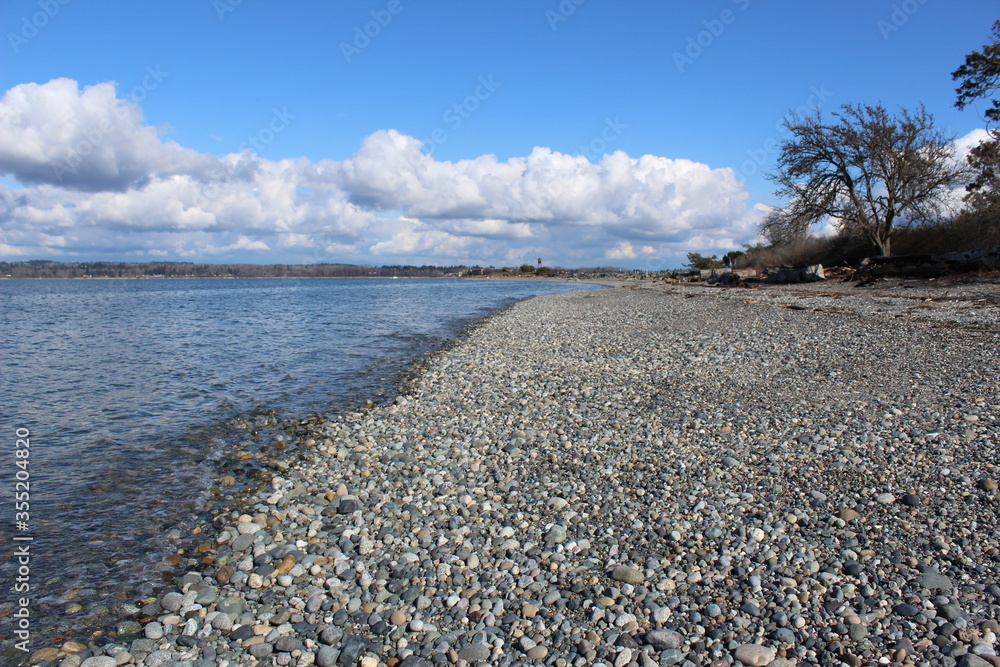 Calm waves wash at Semiahmoo Beach in Washington Calm waves wash at Semiahmoo Beach in Washington