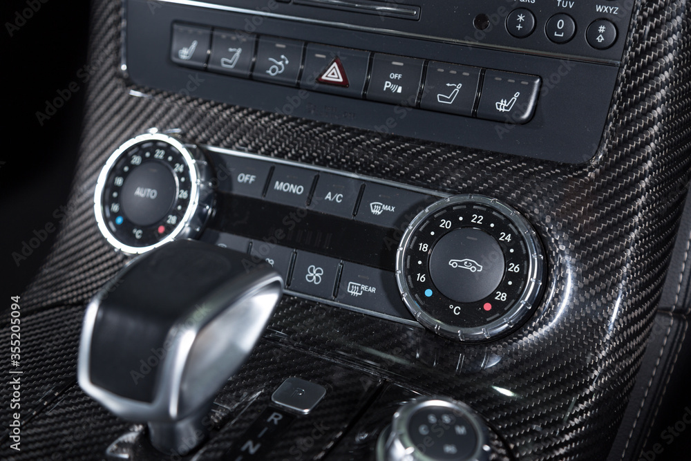 AC control panel in luxury car interior