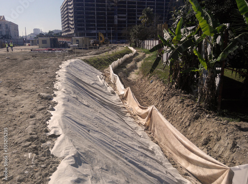 Φωτογραφία MALACCA, MALAYSIA -OCTOBER 26, 2015: Check dam or silt trap at the construction site