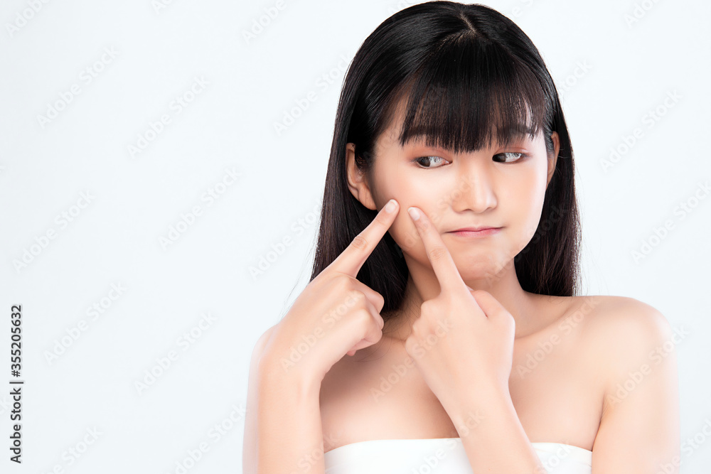 Acne treatment. Acne woman. Young woman squeezing her pimple, removing pimple from her face. Woman skin care concept. Acne spot pimple spot skincare beauty care girl pressing on skin problem face. Acne treatment. Acne woman. Young woman squeezing her pimple, removing pimple from her face. Woman skin care concept. Acne spot pimple spot skincare beauty care girl pressing on skin problem face.