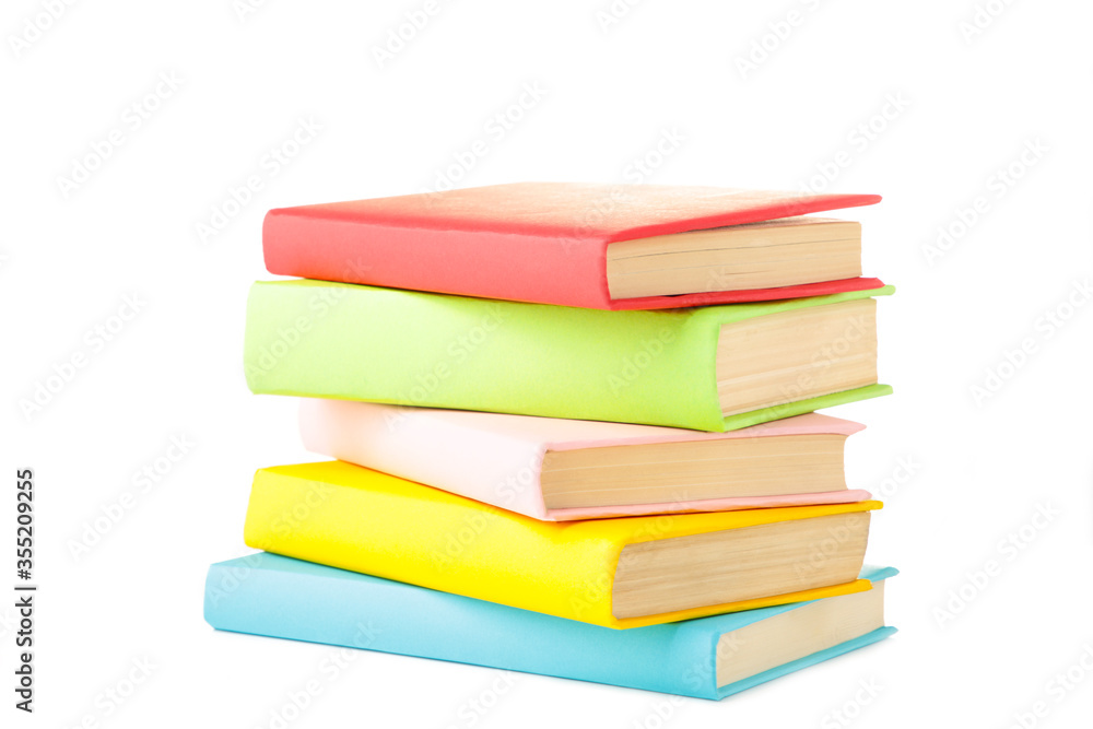 Multi coloured school books isolated on white background with copy space. Back to school Multi coloured school books isolated on white background with copy space. Back to school