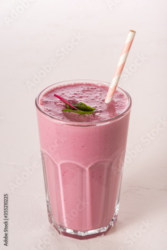 Berry lassi from fermented baked milk. Sour-milk shake.